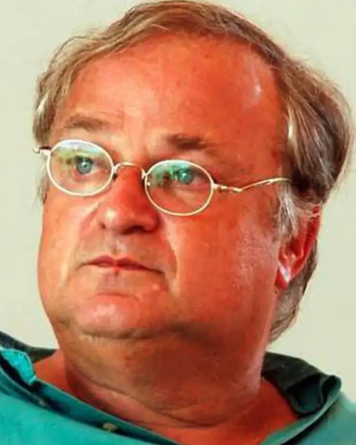Dr. Benny Shanon in glasses wearing a green shirt.
