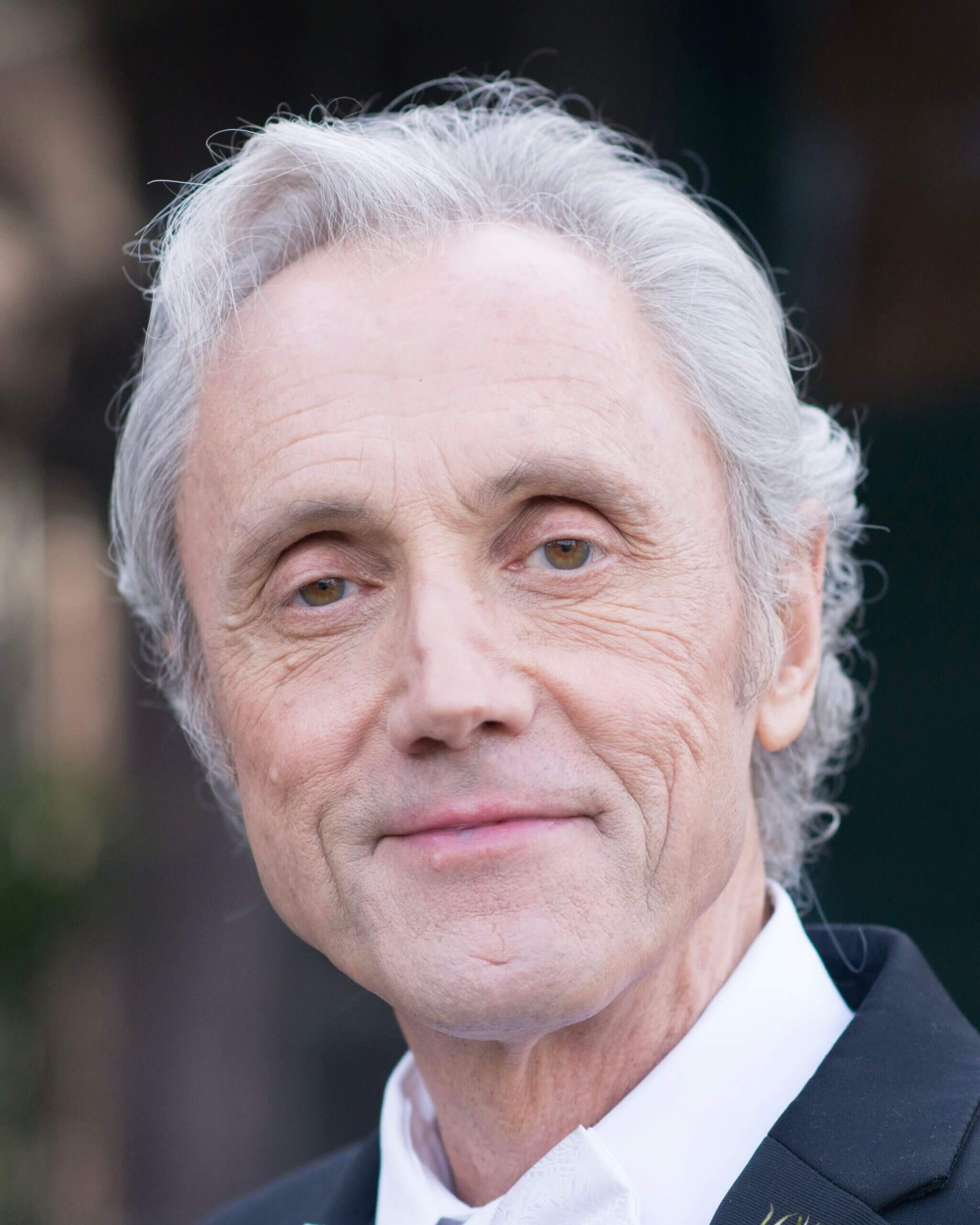 Dr. Richard Tarnas in a suit and tie.